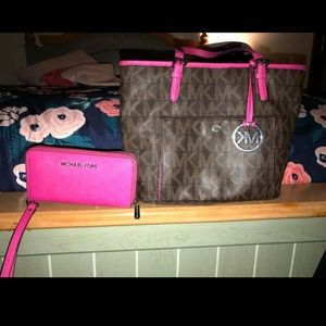Michael Kors purse and matching wallet.